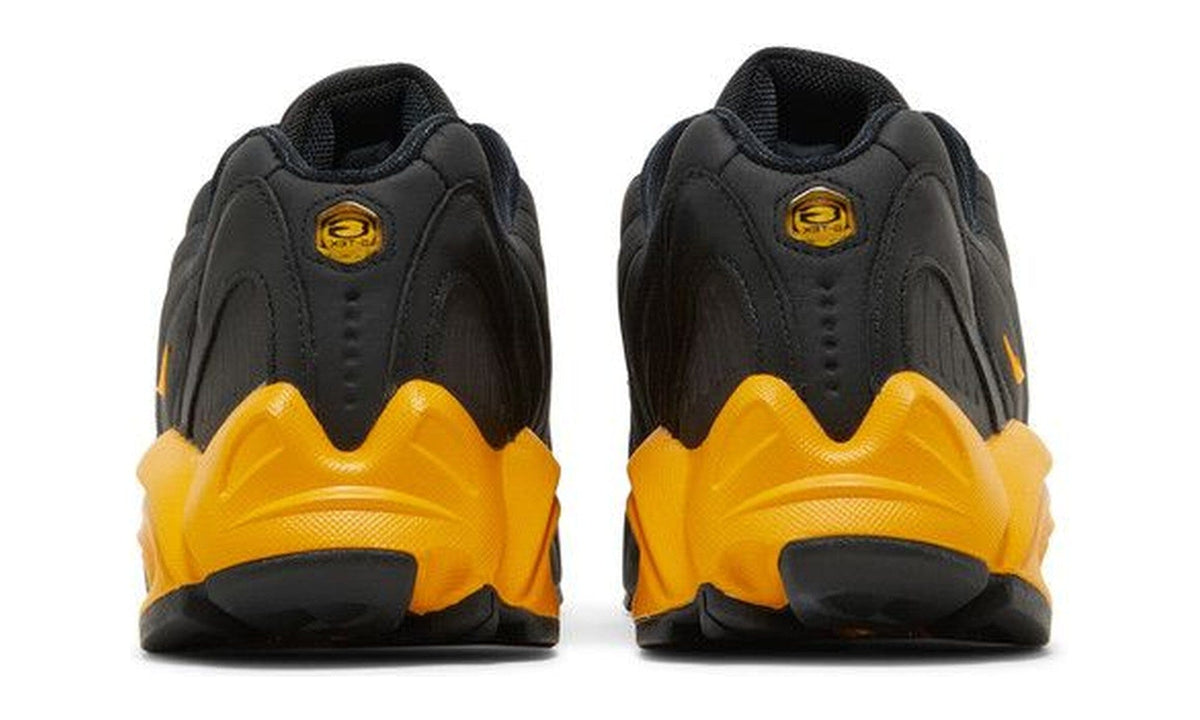 NOCTA x Nike Hot Step Air Terra Black University Gold