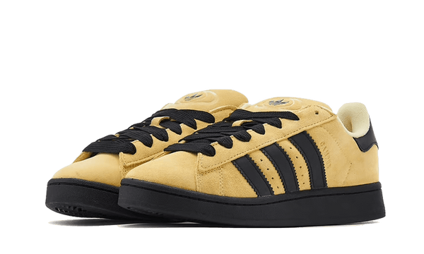 Black and yellow adidas sneakers online